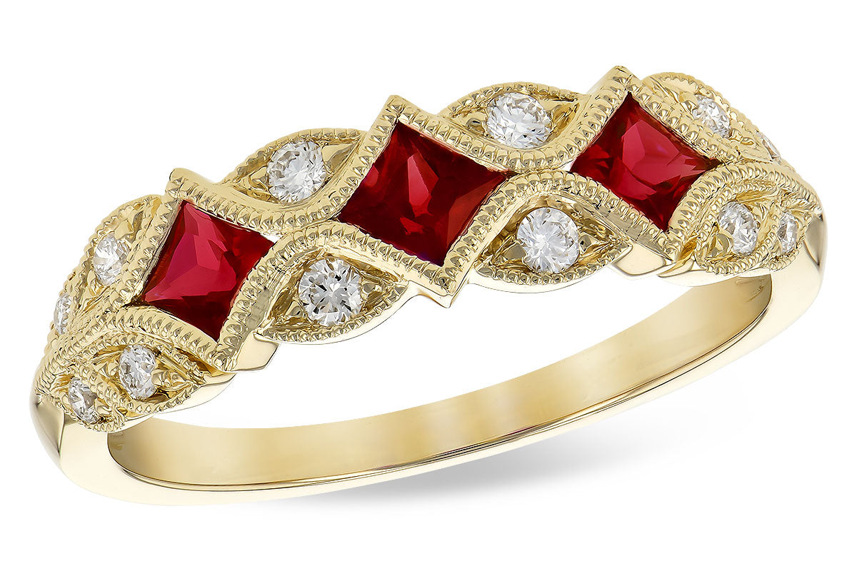 Vintage Three Stone Ruby Ring in 14 Karat Yellow Gold - 0.55 Carat