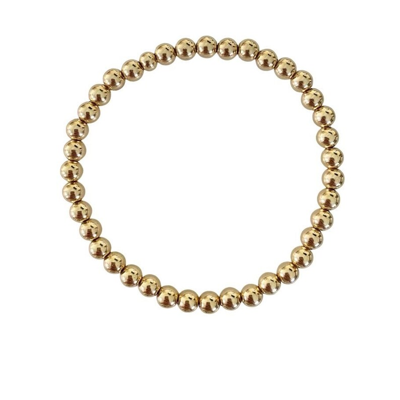 Golden Elegance: Beaded Elastic Bracelet in Gold Plated Sterling Silver