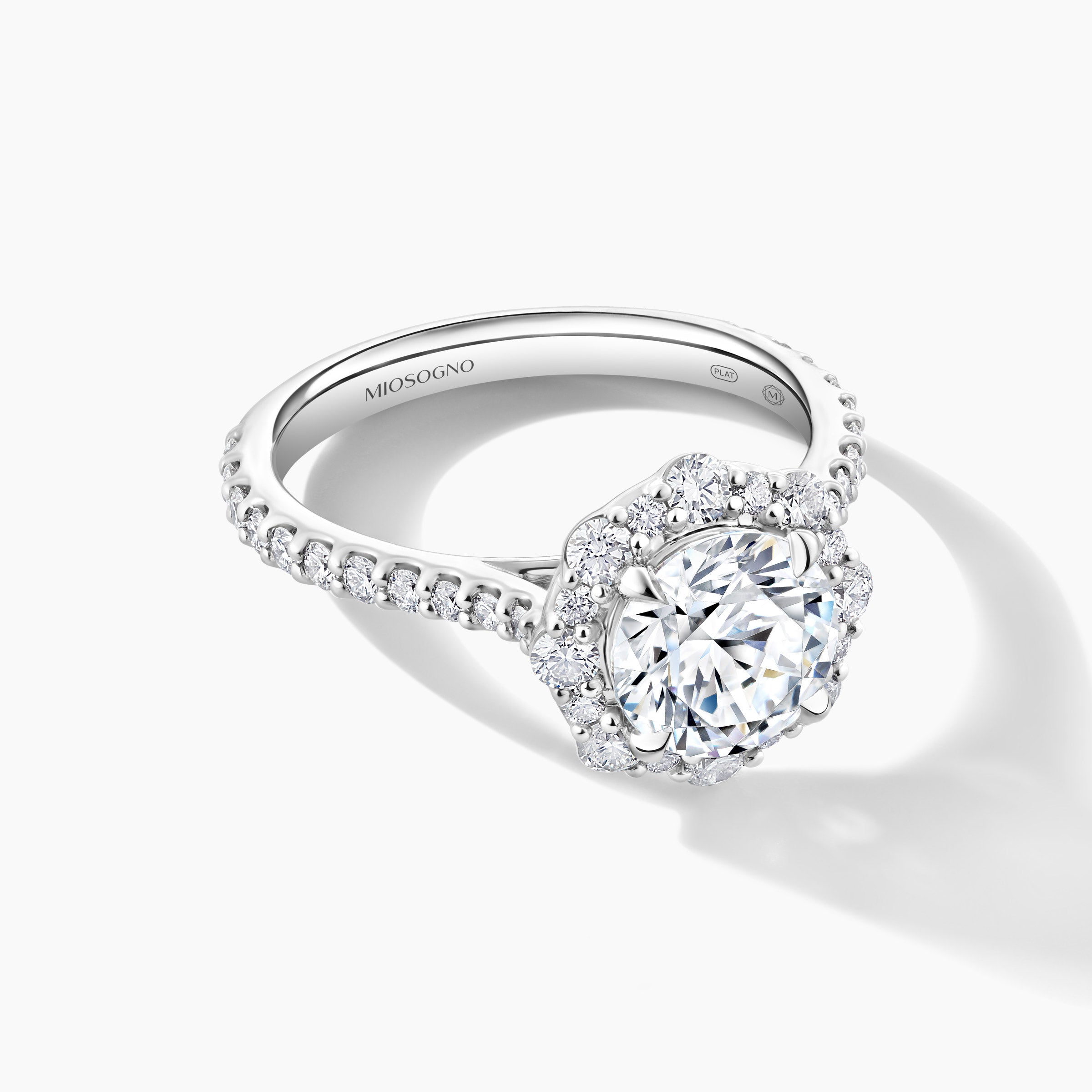 Platinum Diamond Halo Engagement Ring with Tapered Band Setting