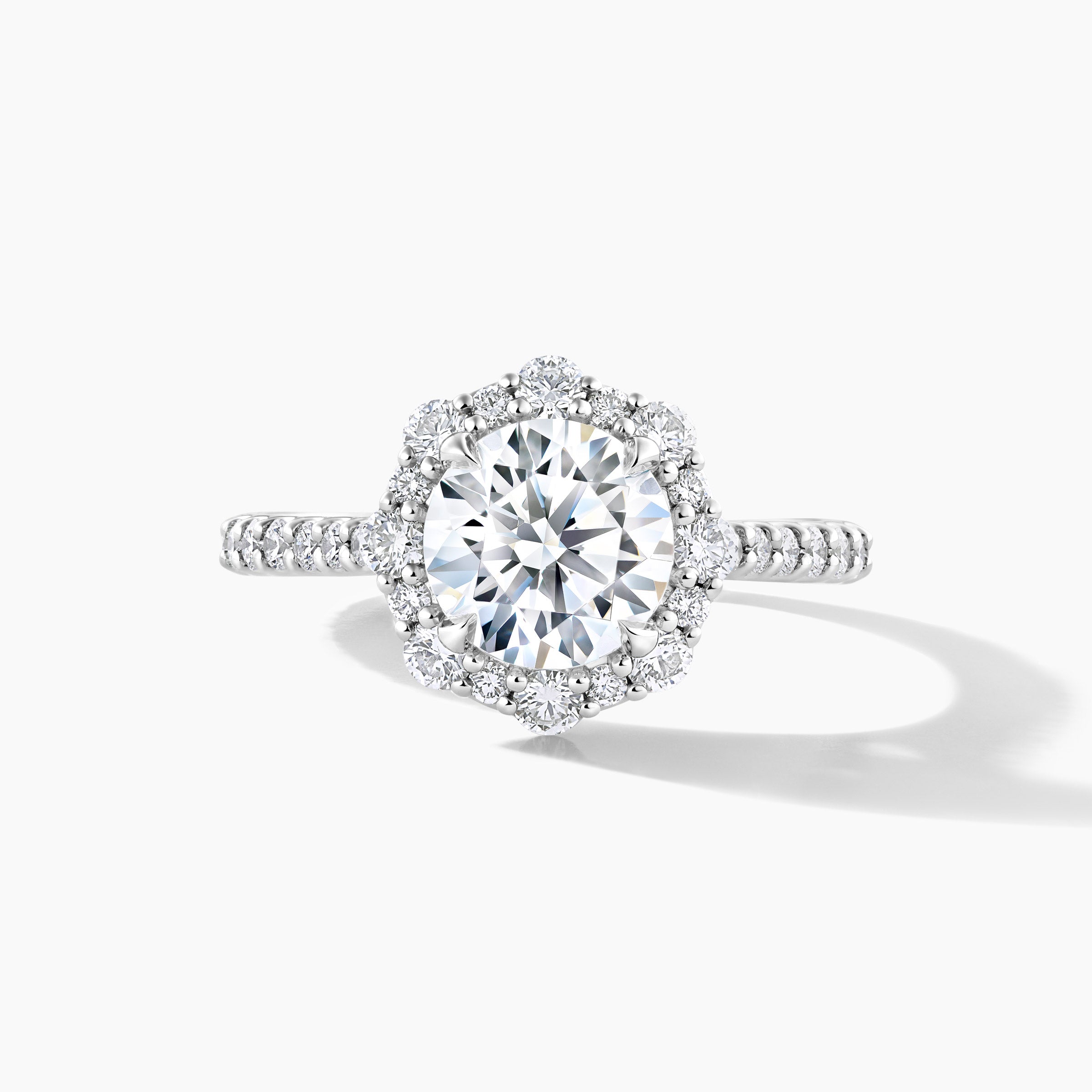 Platinum Diamond Halo Engagement Ring with Tapered Band Setting