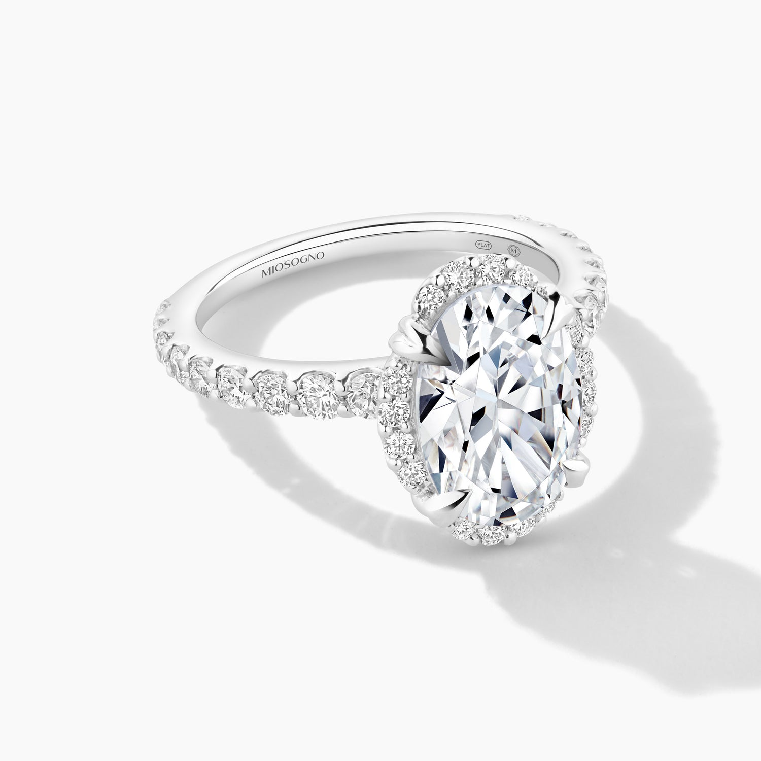 Platinum Oval Clover Halo Engagement Mounting with Diamond Band