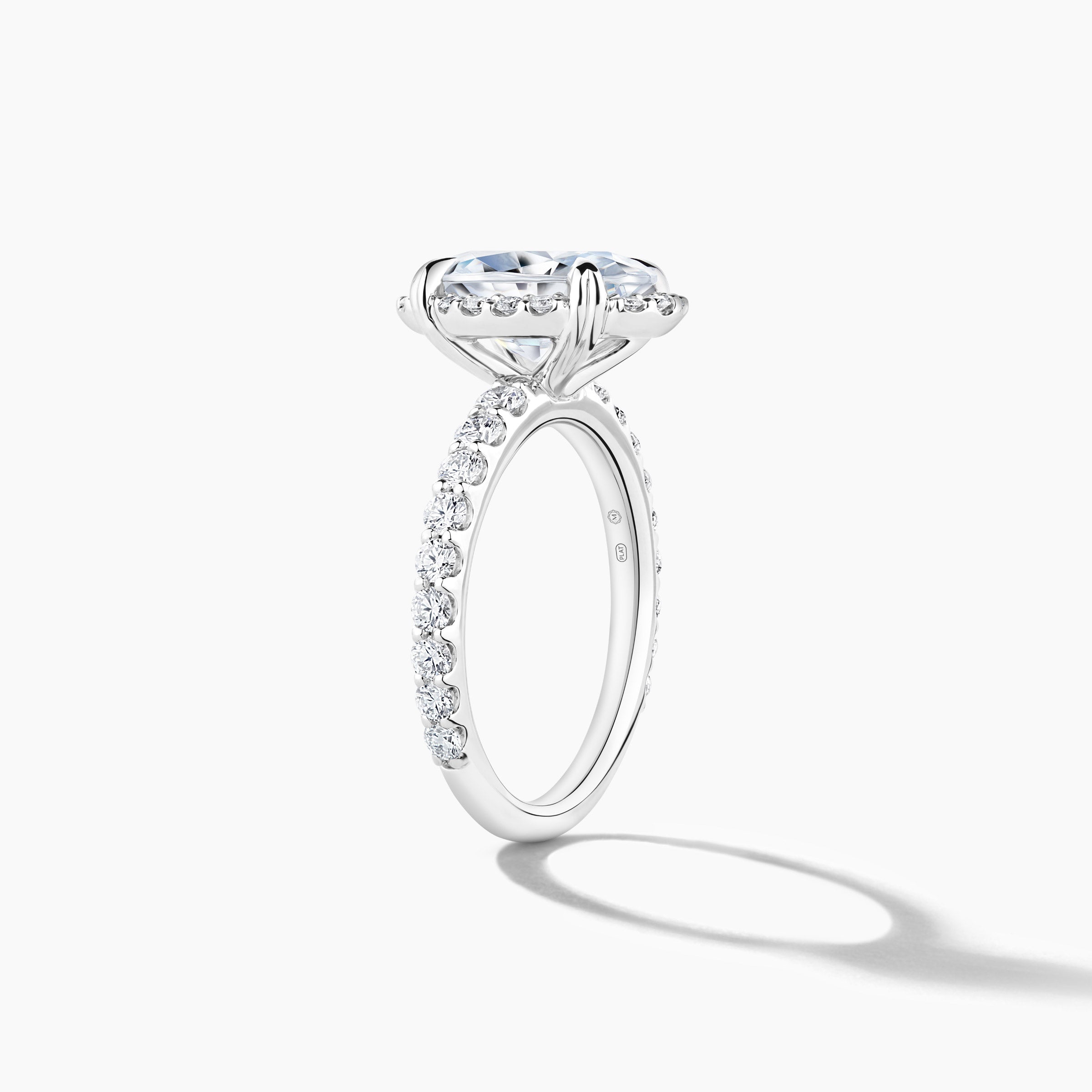Platinum Oval Clover Halo Engagement Mounting with Diamond Band