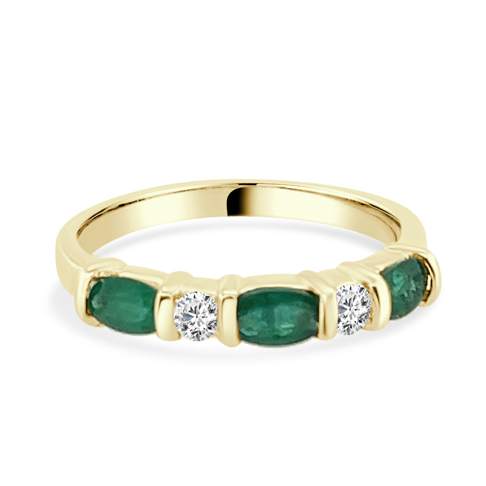 0.75 Carat Oval Emerald and Diamond Chanel Set Band in 14 Karat Yellow Gold