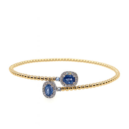 Dazzling Diamond and Sapphire Wrap Bangle in 14 Karat Two-Tone Bracelet with Blue Sapphire Oval Shape - 1.07 Carats