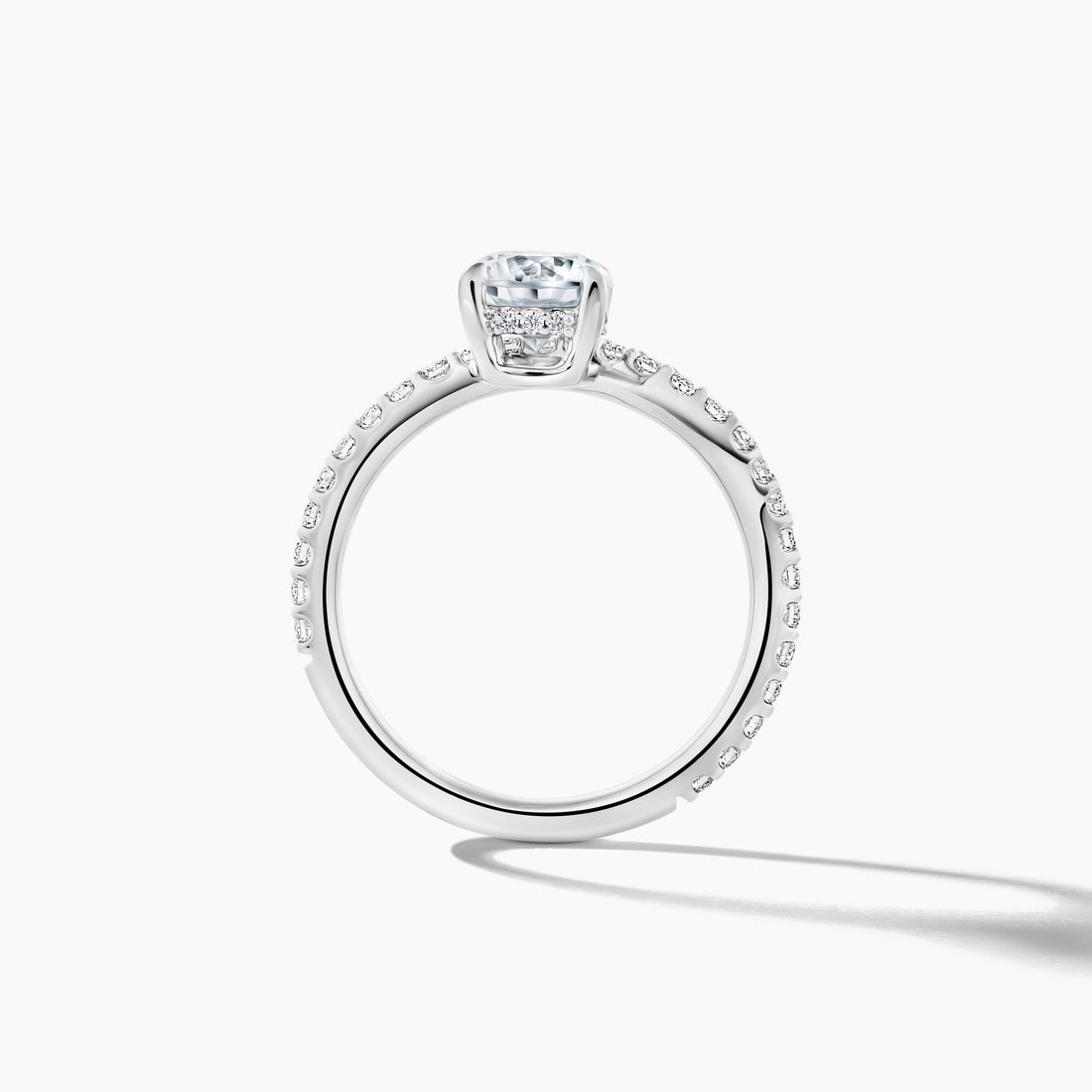 Platinum Off-Center Round Brilliant Cut Engagement Mounting with SMP Wave Shank