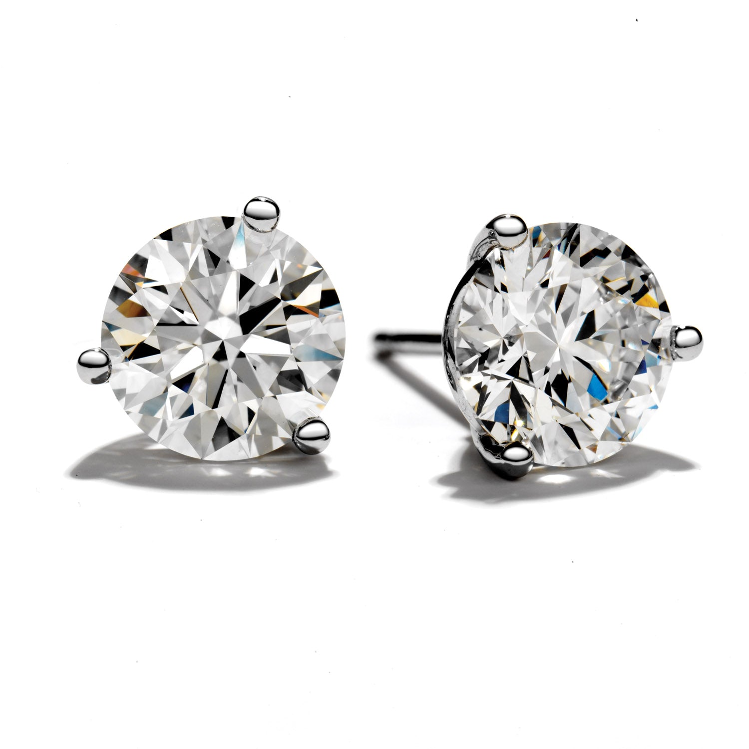 0.72 Carat Round Solitaire Studs in 14 Karat White Gold with Three Prong Setting