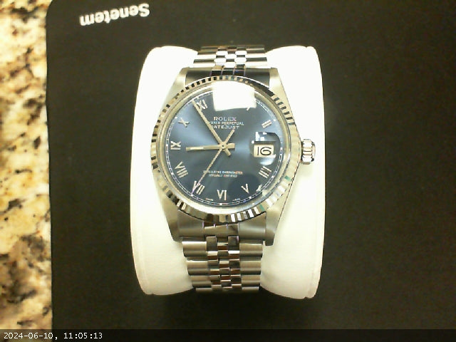 Rolex Luxury Watch with Blue Roman Numerals