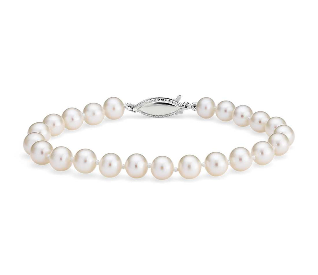 Dainty Elegance: 14 Karat White Gold Pearl Bracelet