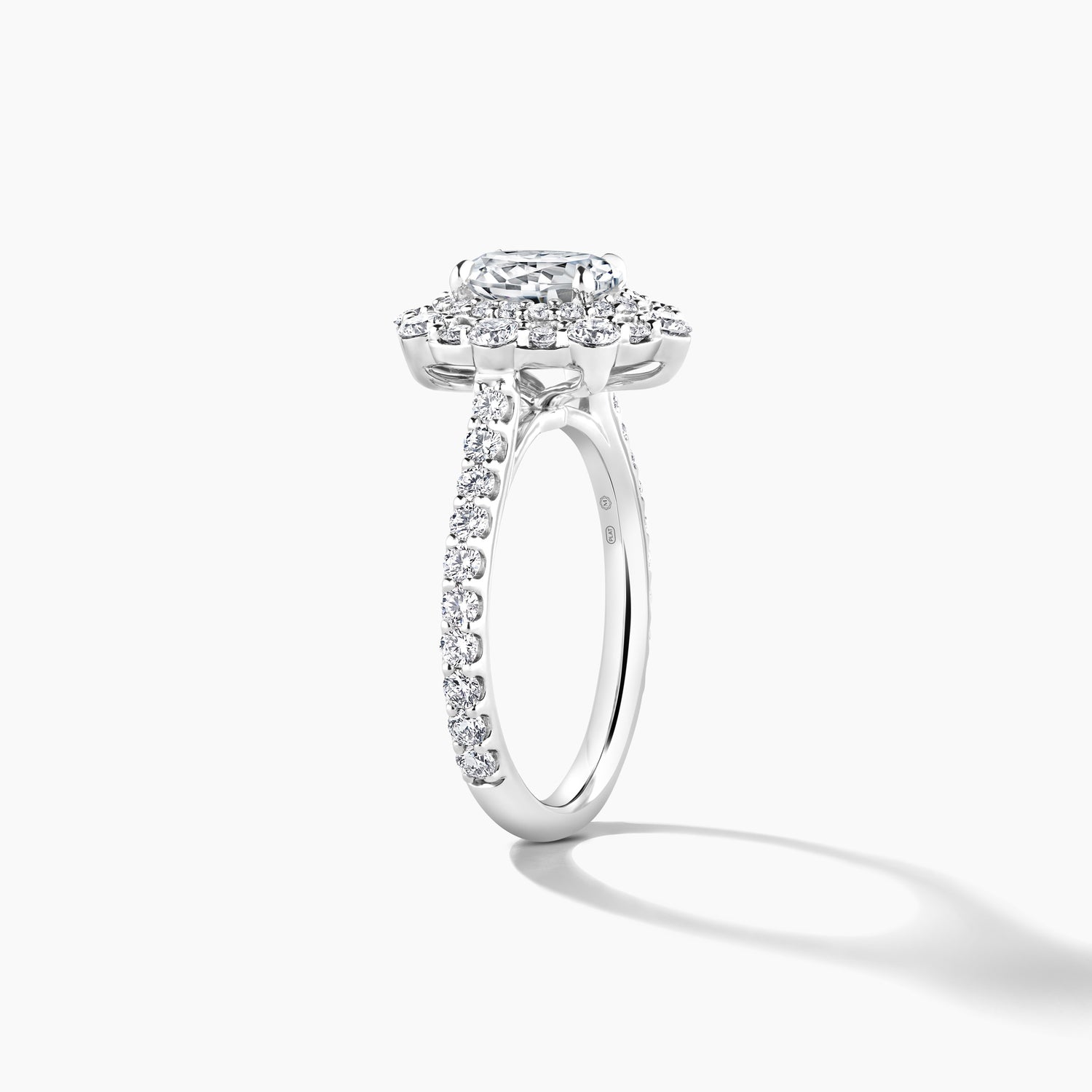 Exquisite Platinum Engagement Mounting with SMP Oval Double Halo and Diamond Band