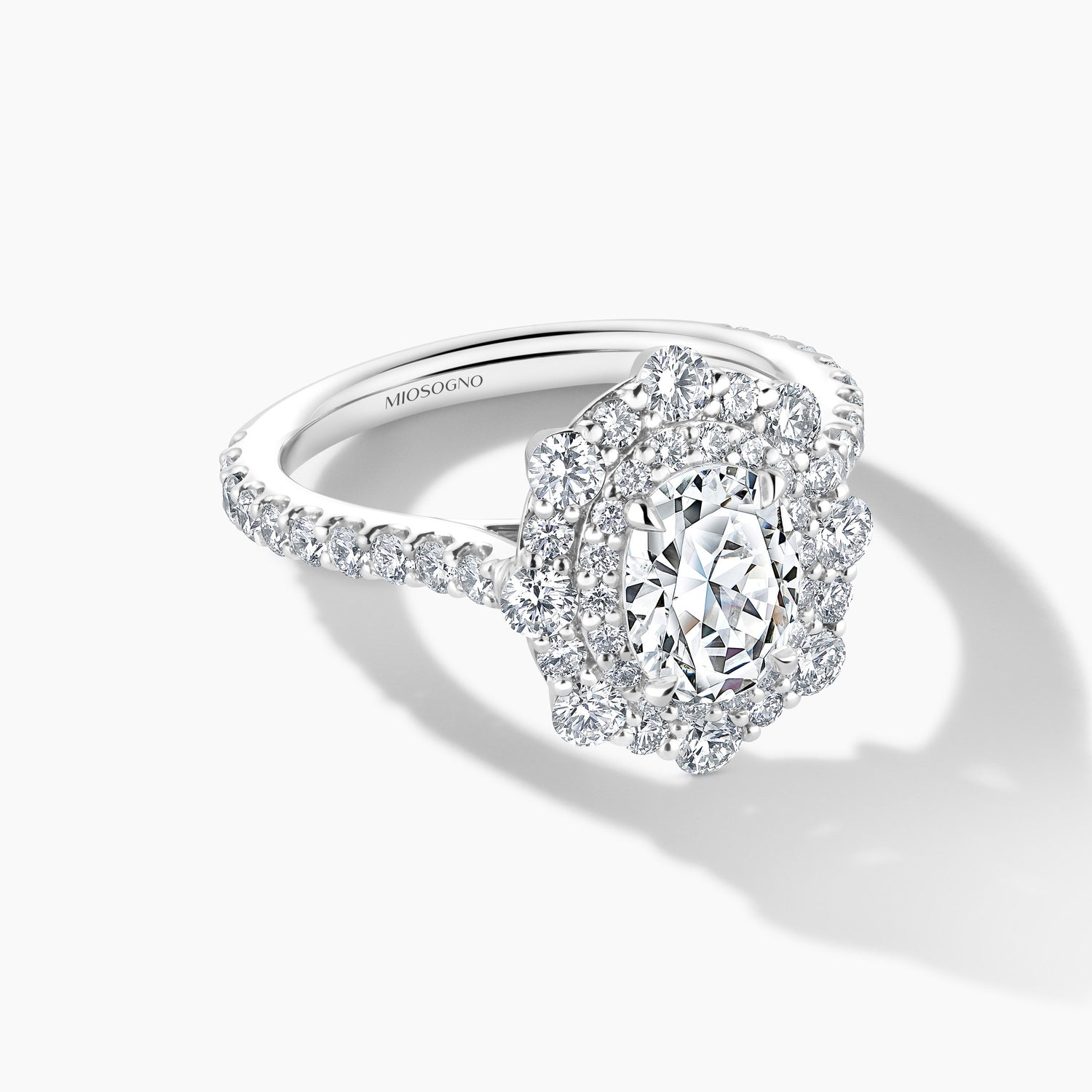 Exquisite Platinum Engagement Mounting with SMP Oval Double Halo and Diamond Band