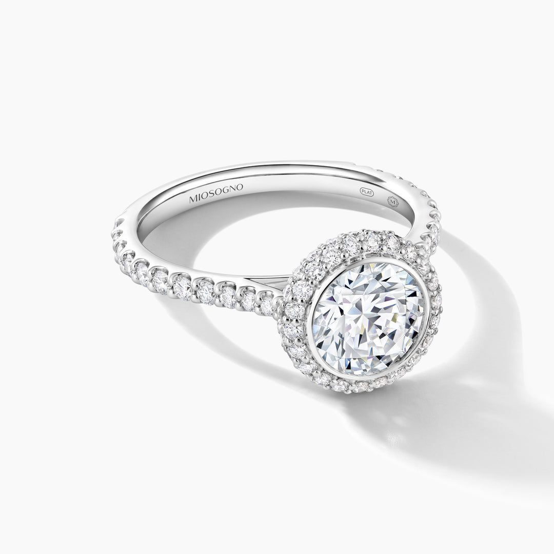 Platinum Bezel Set Engagement Ring with Pave Halo and Diamond Band - Round Cubic Zirconia