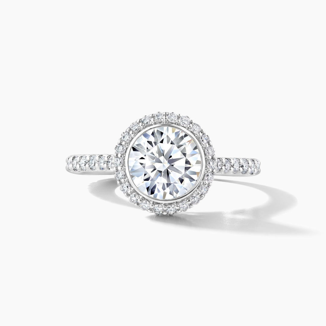 Platinum Bezel Set Engagement Ring with Pave Halo and Diamond Band - Round Cubic Zirconia