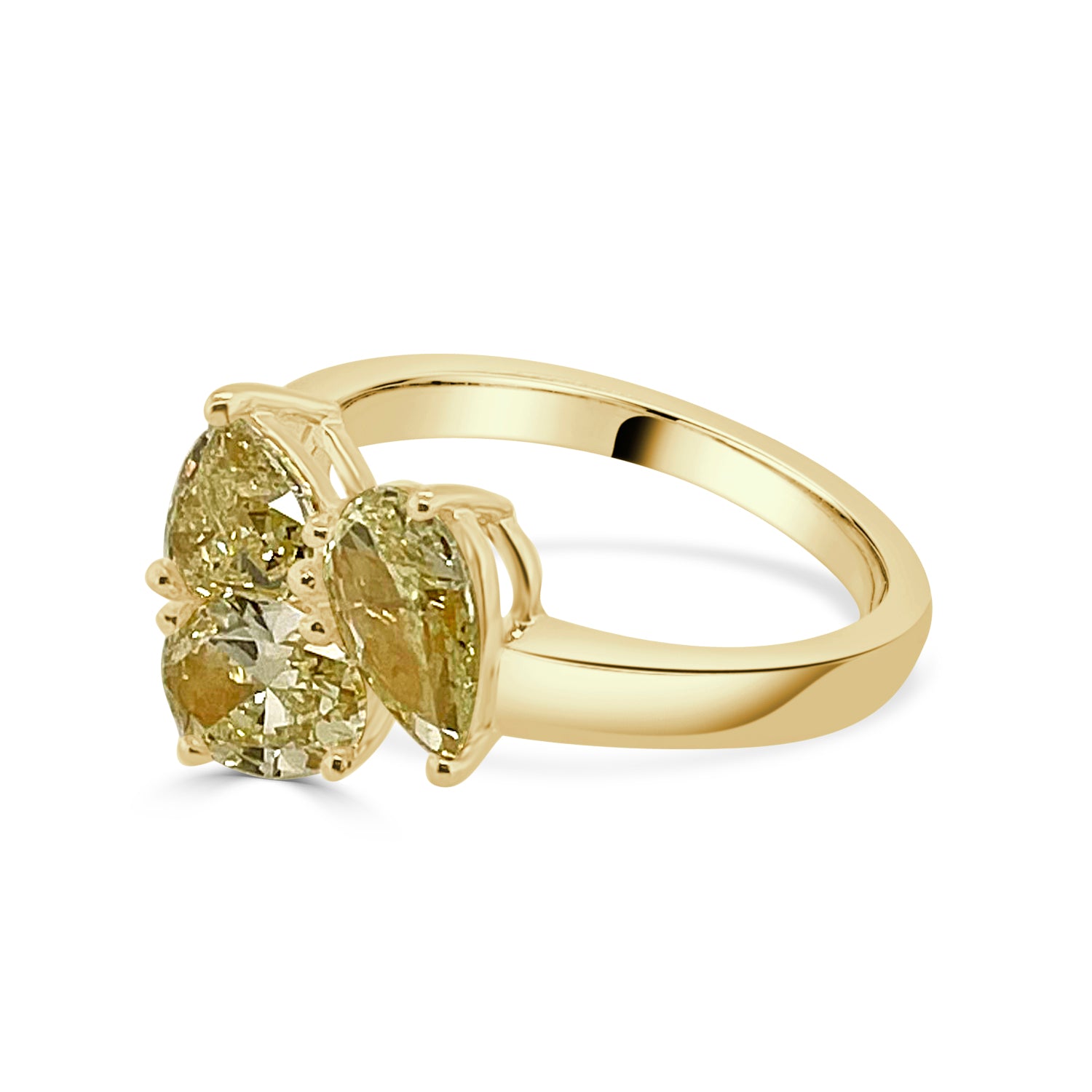 Oval Pear and Trillion Three Stone Ring in 18 Karat Yellow Gold with a 2.12 Yellow Diamond