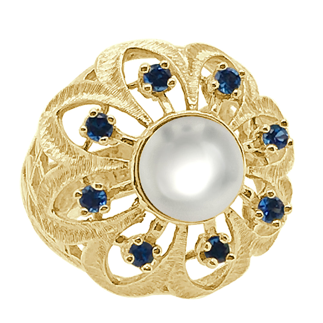 Vintage Blue Stone Halo Ring with Pearl Accent in 14 Karat Yellow Gold - Pear-shaped Elegance