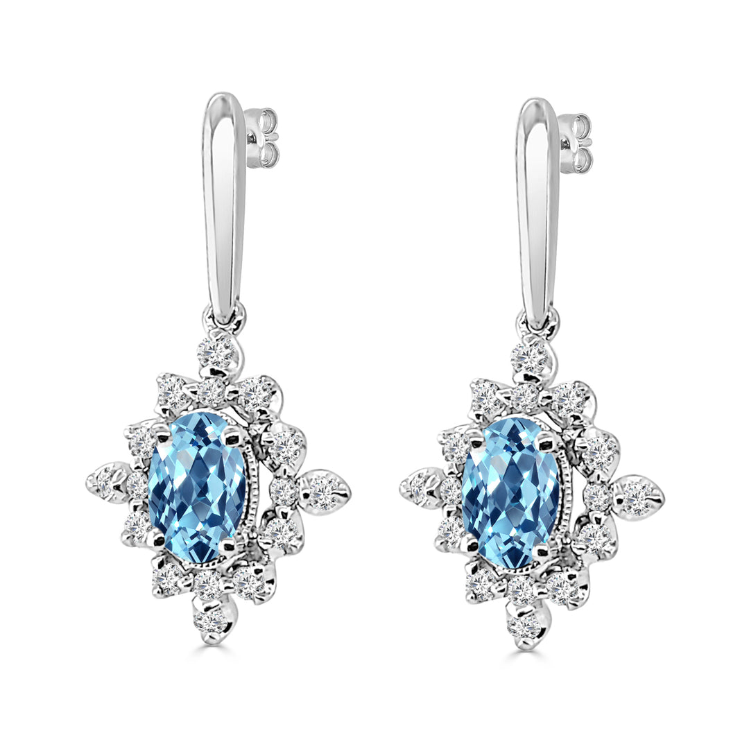 Oval Aquamarine Halo Earrings in 14 Karat White Gold - 0.84 ct