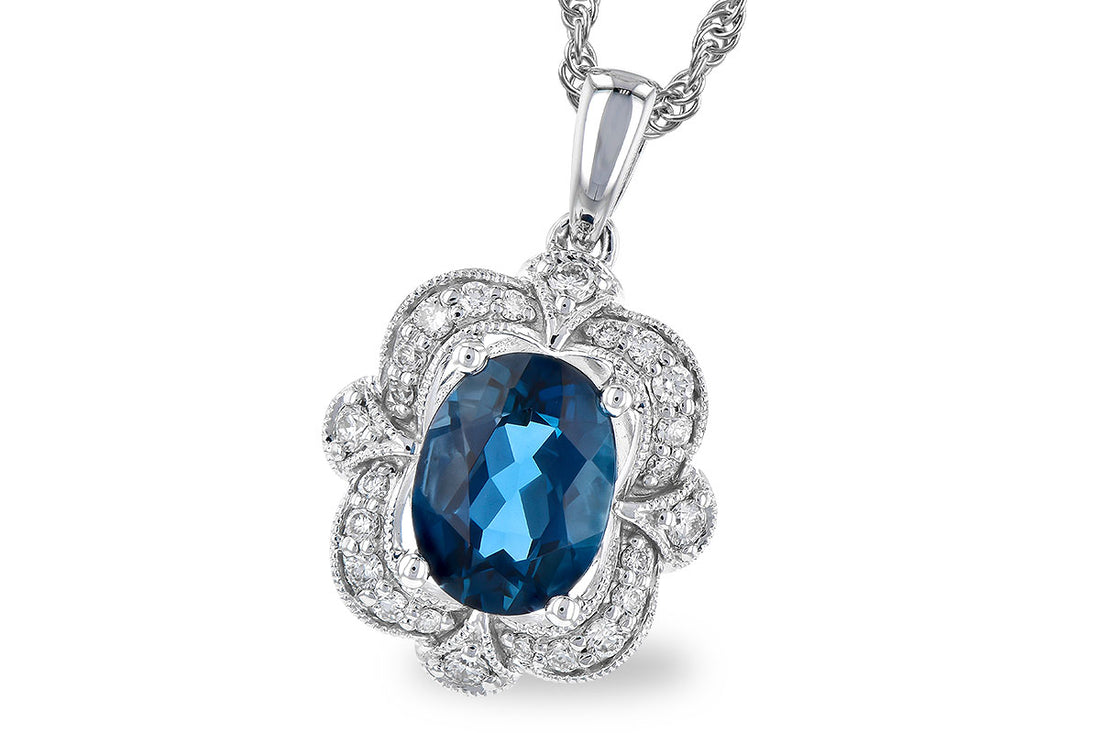 Vintage Oval Halo Blue Topaz Necklace in 14 Karat White Gold - 1.35 Carats