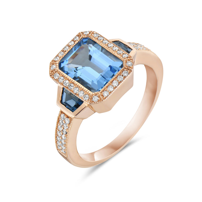 Stunning 3 Stone Halo Blue Topaz Ring in 14 Karat Rose Gold - 2.62 Carats
