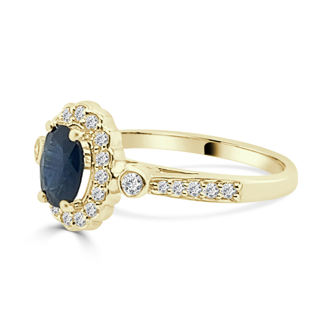 Exquisite Oval Blue Sapphire Ring with Diamond Halo in 14 Karat Yellow Gold