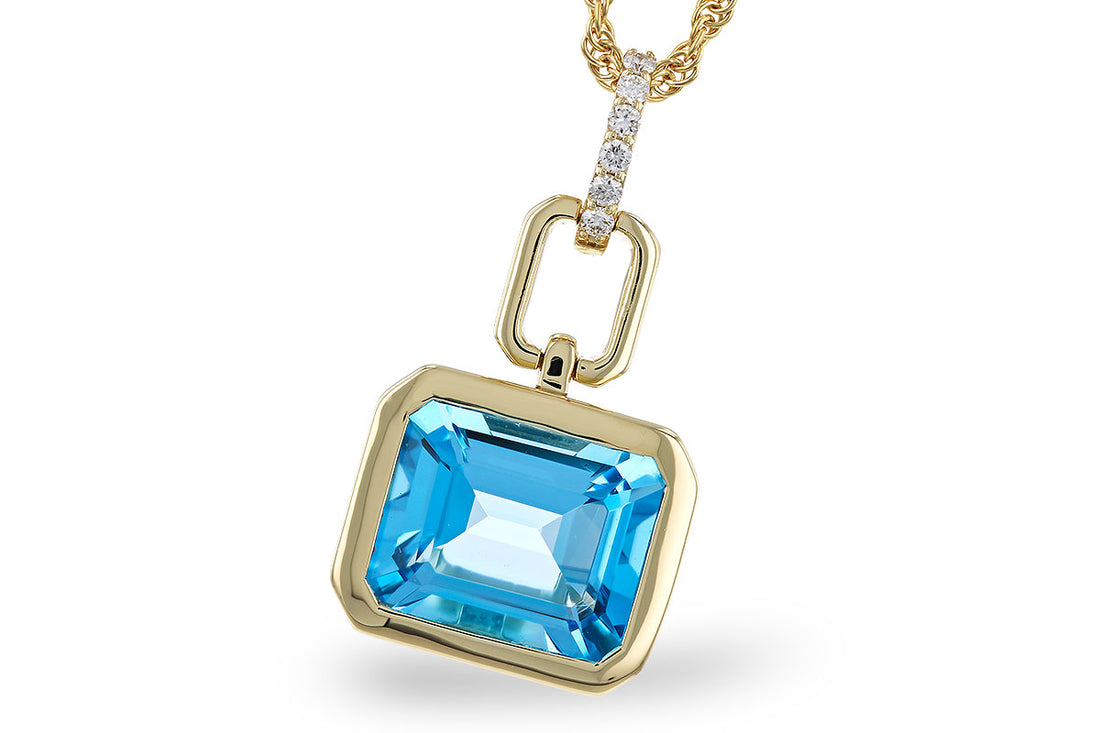14K Yellow Gold Blue Topaz Emerald Shape Pendant – 3.26 Carats
