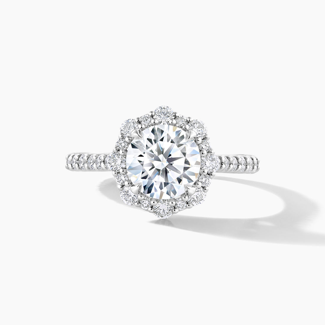 Platinum Diamond Halo Engagement Ring with Tapered Band Setting