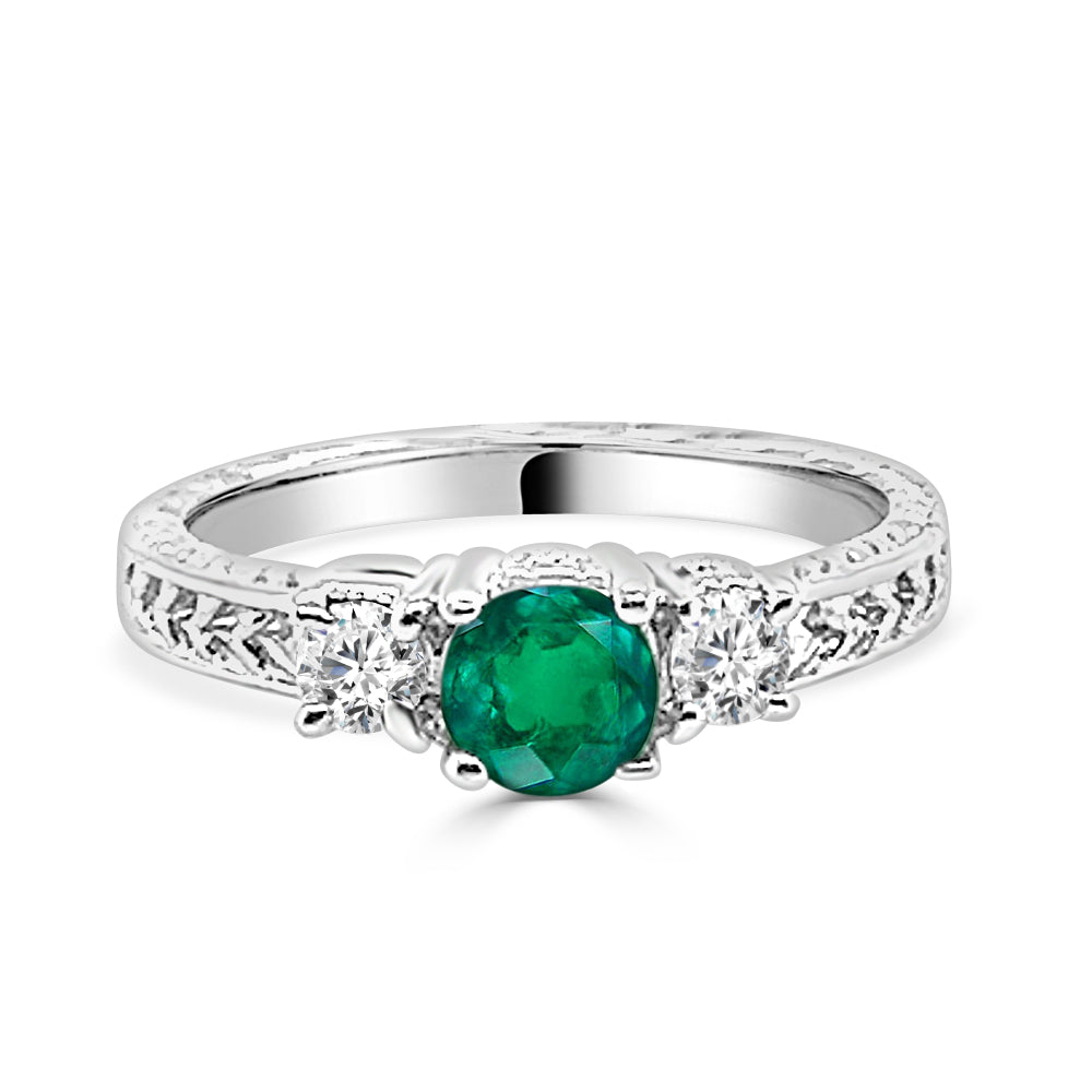 Exquisite Trio: Round Emerald and Diamond Three Stone Ring in 14 Karat White Gold