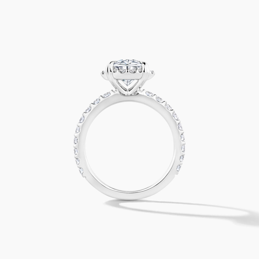 Pristine Platinum Oval Engagement Mounting with Clover Halo and Diamond Band