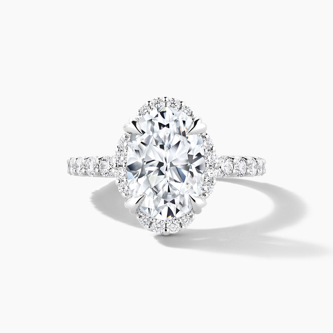 Platinum Oval Clover Halo Engagement Mounting with Diamond Band