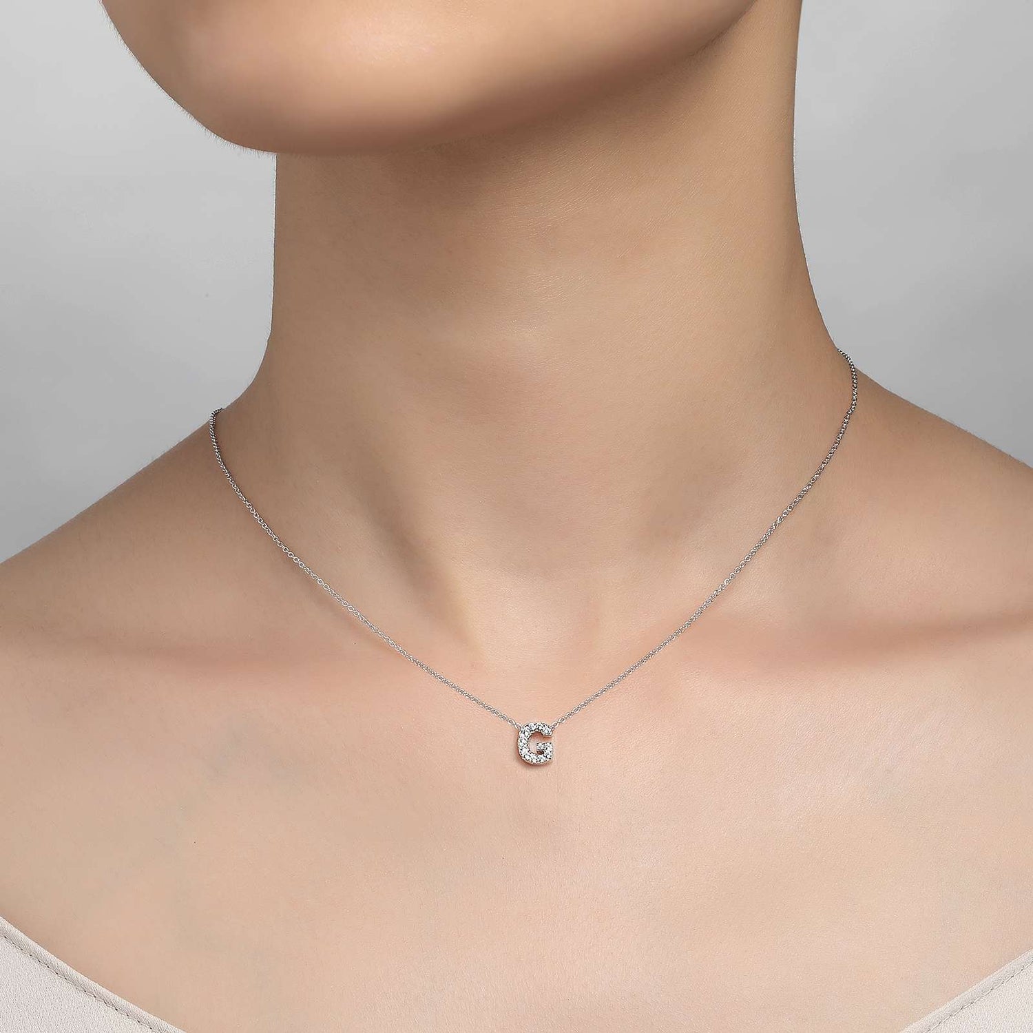 Platinum Coated Sterling Silver Block Letter G Necklace with Lassaire Accents - 0.38 Carat