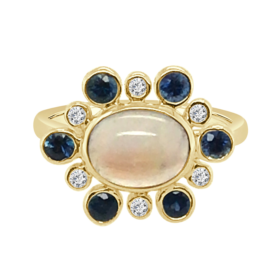 Moonlit Elegance: 14 Karat Yellow Gold Ring with Alt Sapp & Dia Halo Featuring Oval Cabochon Moonstone