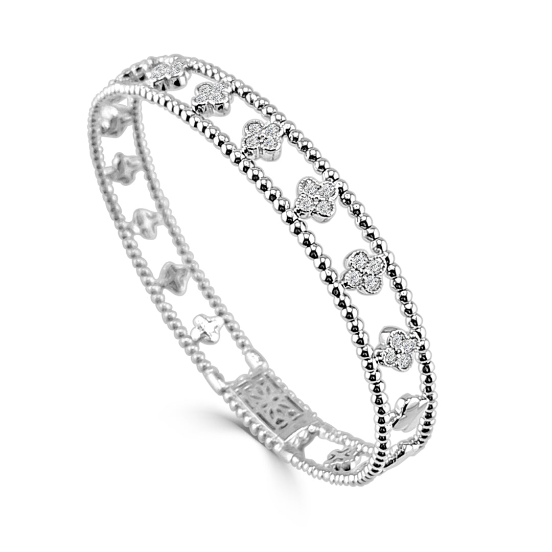 Exquisite 14 Karat Two-Tone Bangle with Natural Diamond Accent