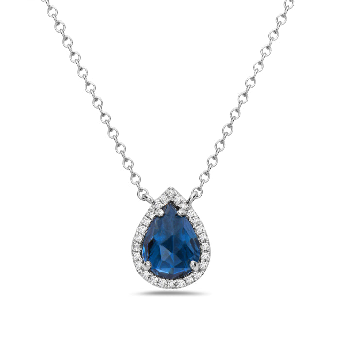 Blue Topaz Halo Checkerboard Pear Necklace in 14 Karat White Gold