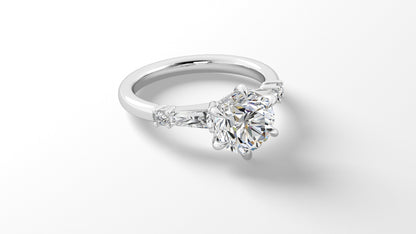 Elegant Platinum Engagement Ring with Tapered Baguettes and Hidden Halo Mounting