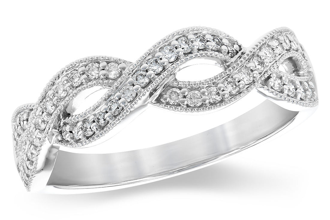 Twisted Brilliance: 14 Karat White Gold Ring with Natural Diamond 0.25 ct